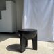Black mango wood tripod side table with a semi-spherical top, height: 45 cm, diameter: 44 cm.