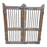Old gate in Burmese teak and wrought iron