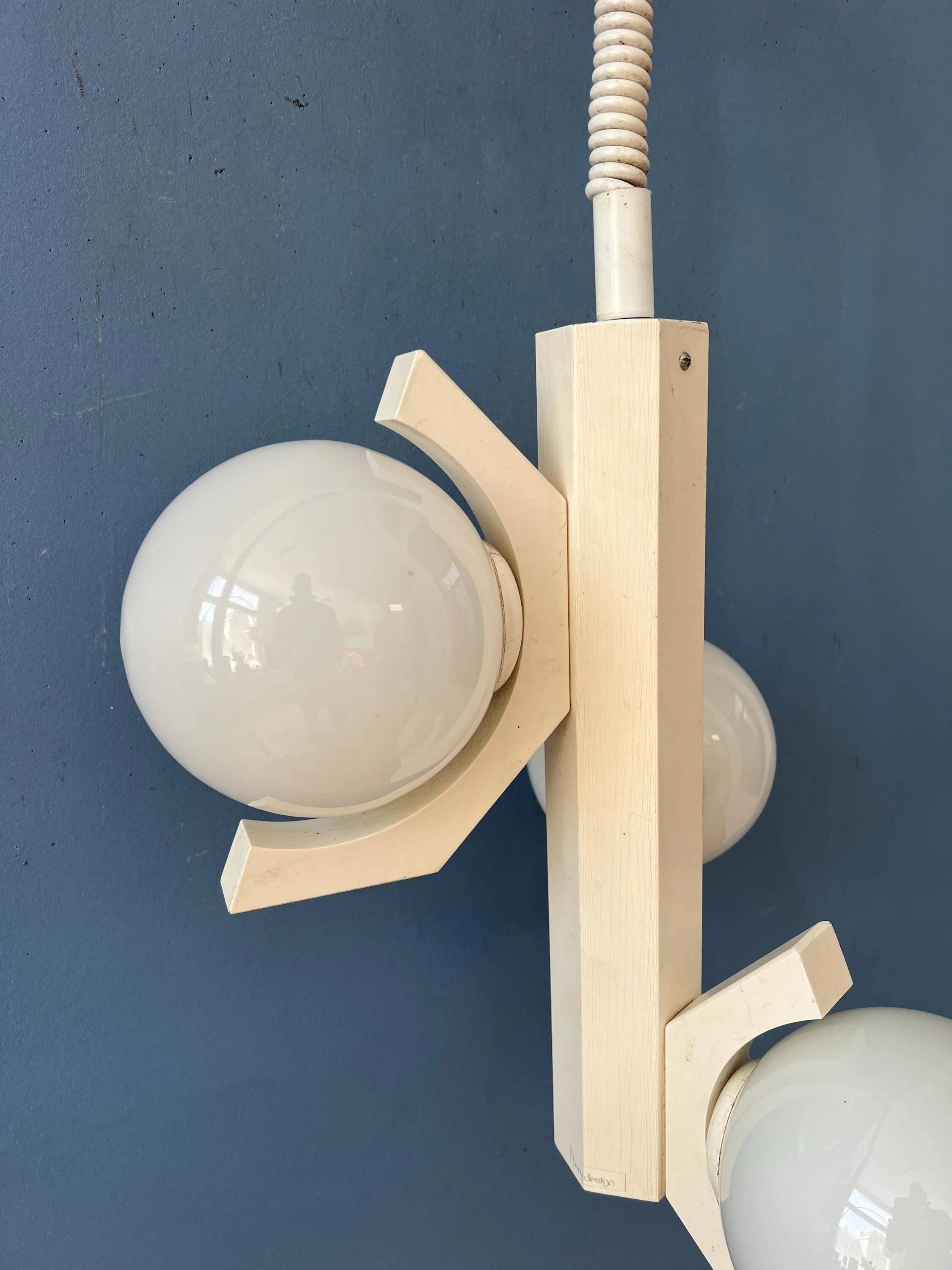 Mid-century white suspension with a bony design and opaline glass shade.