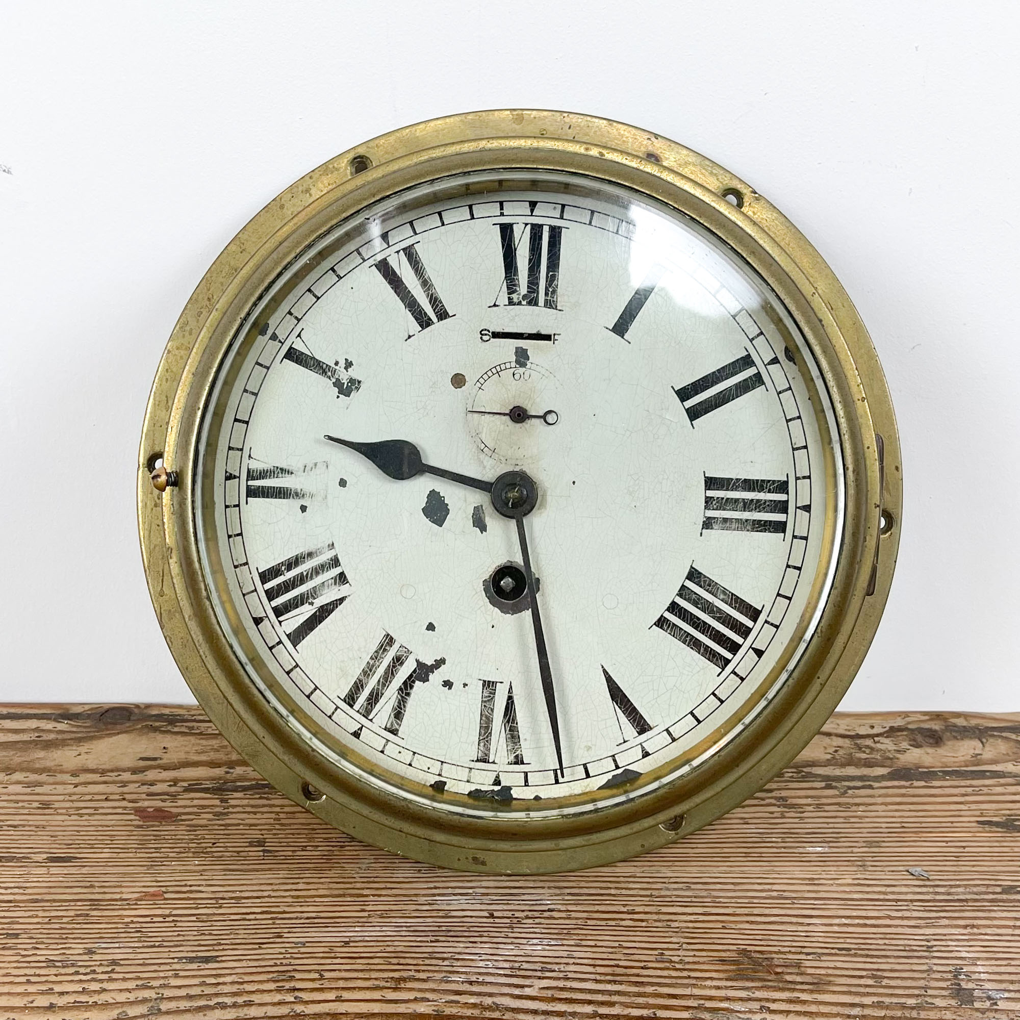 Antique brass navy ship clock