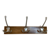 Old coat rack wood metal three hooks