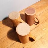 Set of three large sandstone mugs