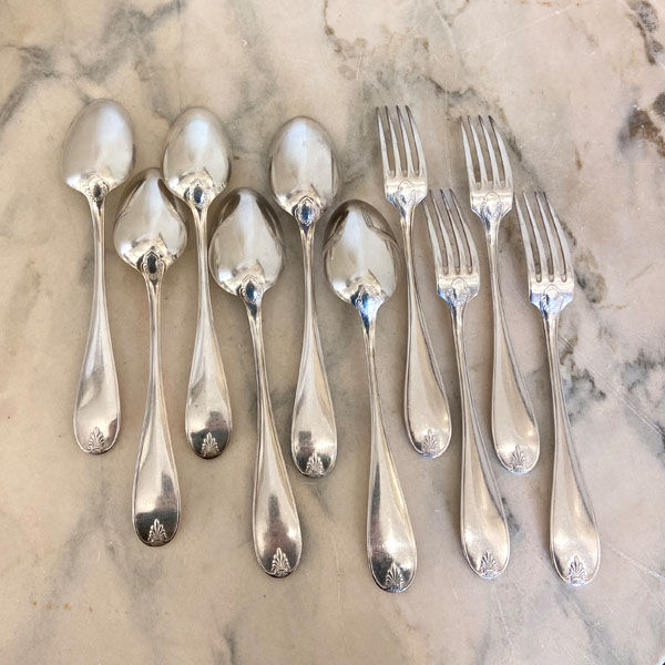 Large spoons and forks, silver metal
