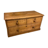Old dresser with wooden drawers