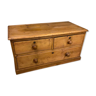 Old dresser with wooden drawers