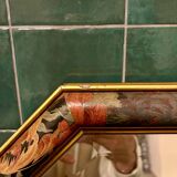 Vintage beveled mirror with floral frame