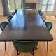 Large dining table in BS Style made of black oak and iron.