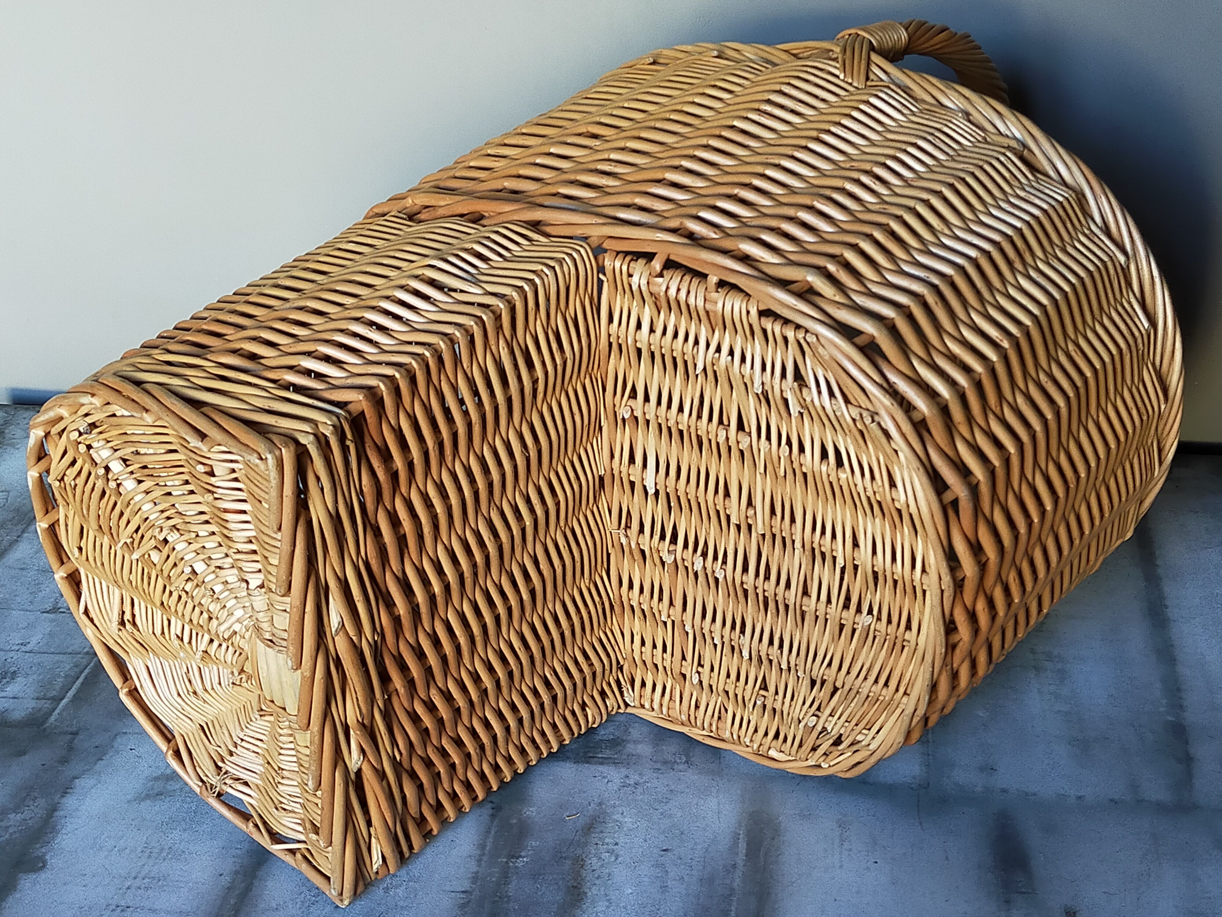 Asymmetrical woven rattan basket