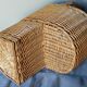 Asymmetrical woven rattan basket