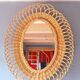 Miroir ovale en rotin 1960