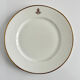 Service d’assiettes à bord doré, monogrammées | E. Bourgeois | Fin XIX