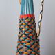 Bottle scoubidous conical