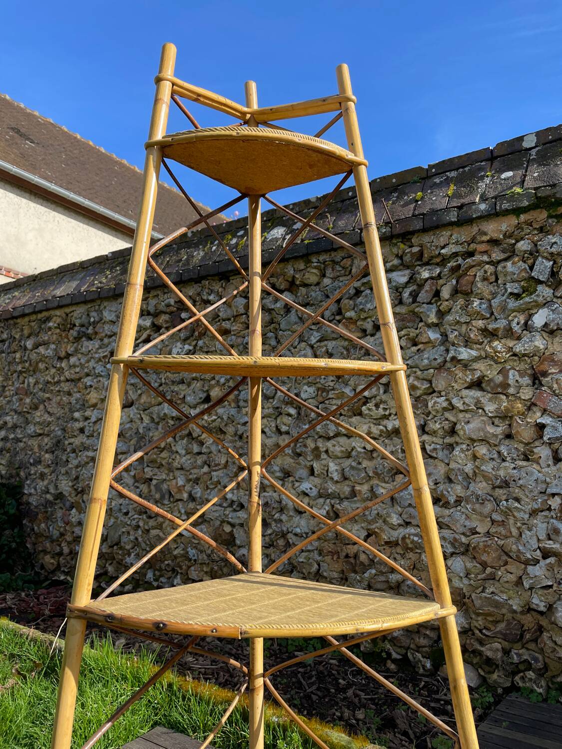 Audoux Minnet style corner shelf in vintage rattan 1950