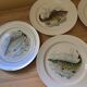 Fish service 7 pieces - 6 plates and 1 large dish - in porcelain from L.