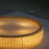 Modern mid-century ceiling/wall lamp from the 1950s in linen, made in Sweden.