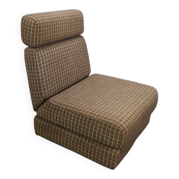 Vintage pull-out sofa bed, brown checked lounge chair with chrome.
