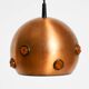 Suspension en cuivre massif des années 1960 avec des pierres en verre synthétique orange.