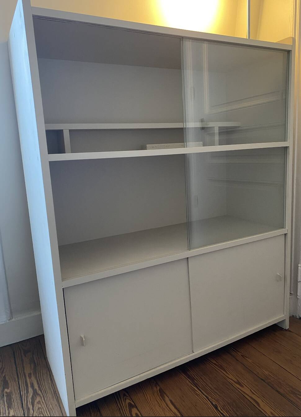 Beige wooden bookshelf