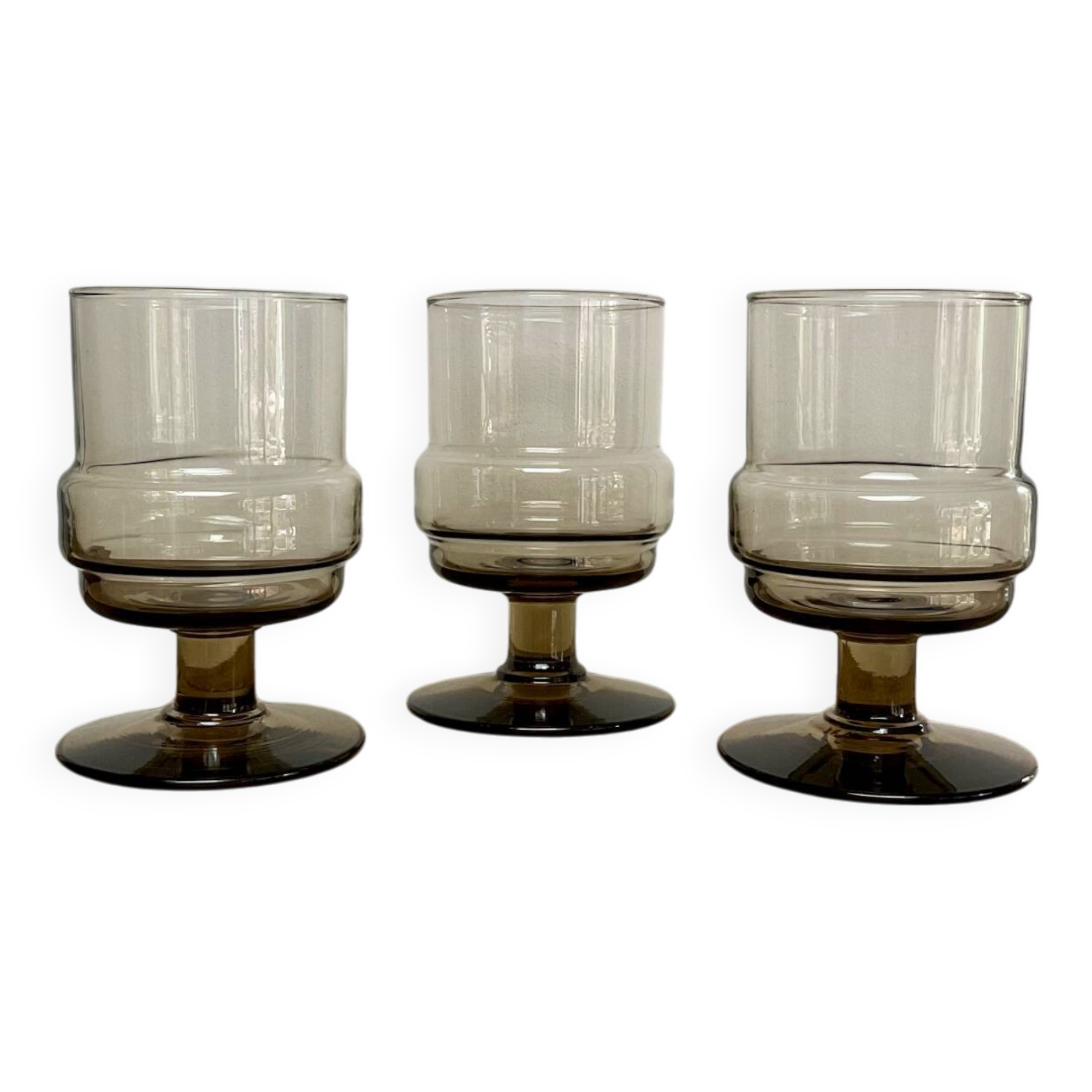 3 “Willem Heesen” smoked glass glasses
