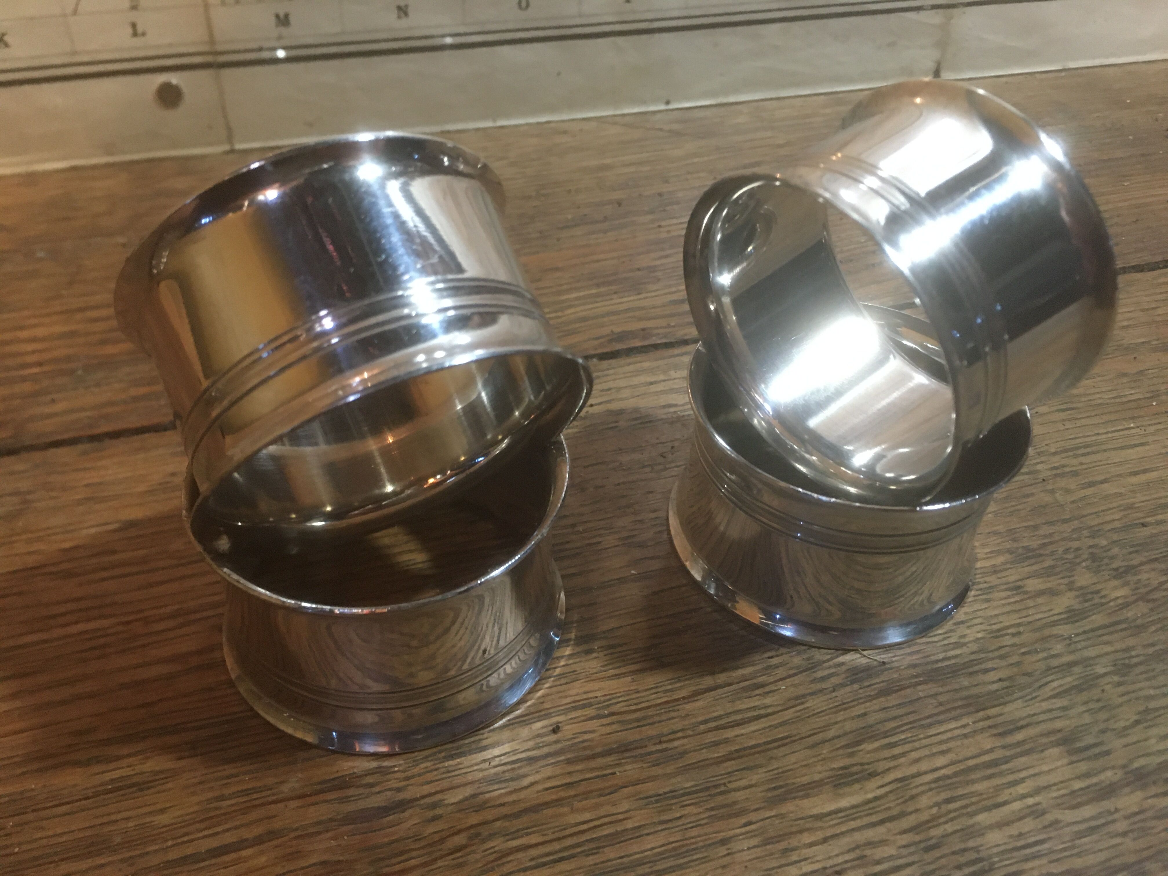 Set of 4 silver metal napkin rings