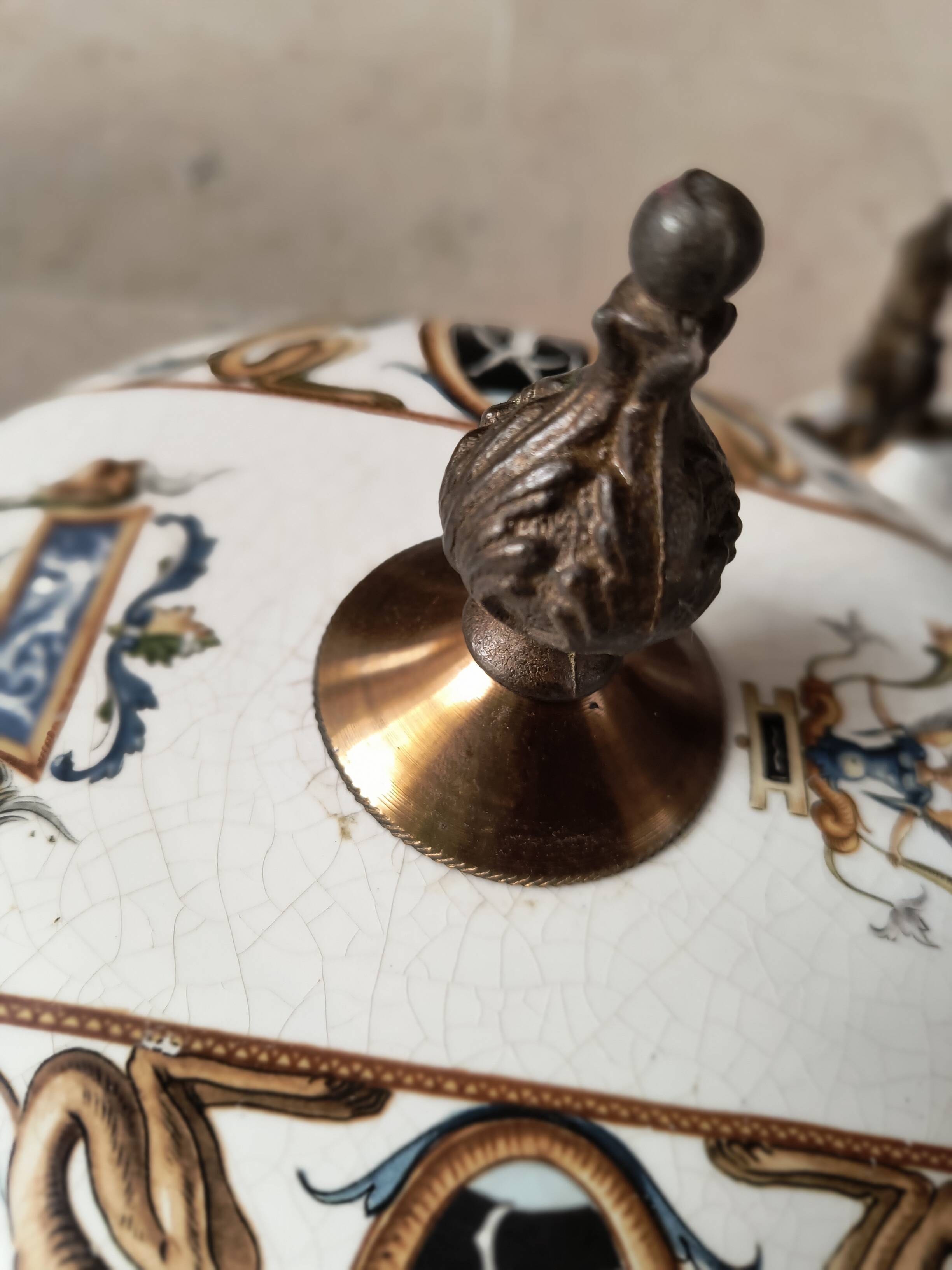 Lustrous bronze, copper and gien-style earthenware.