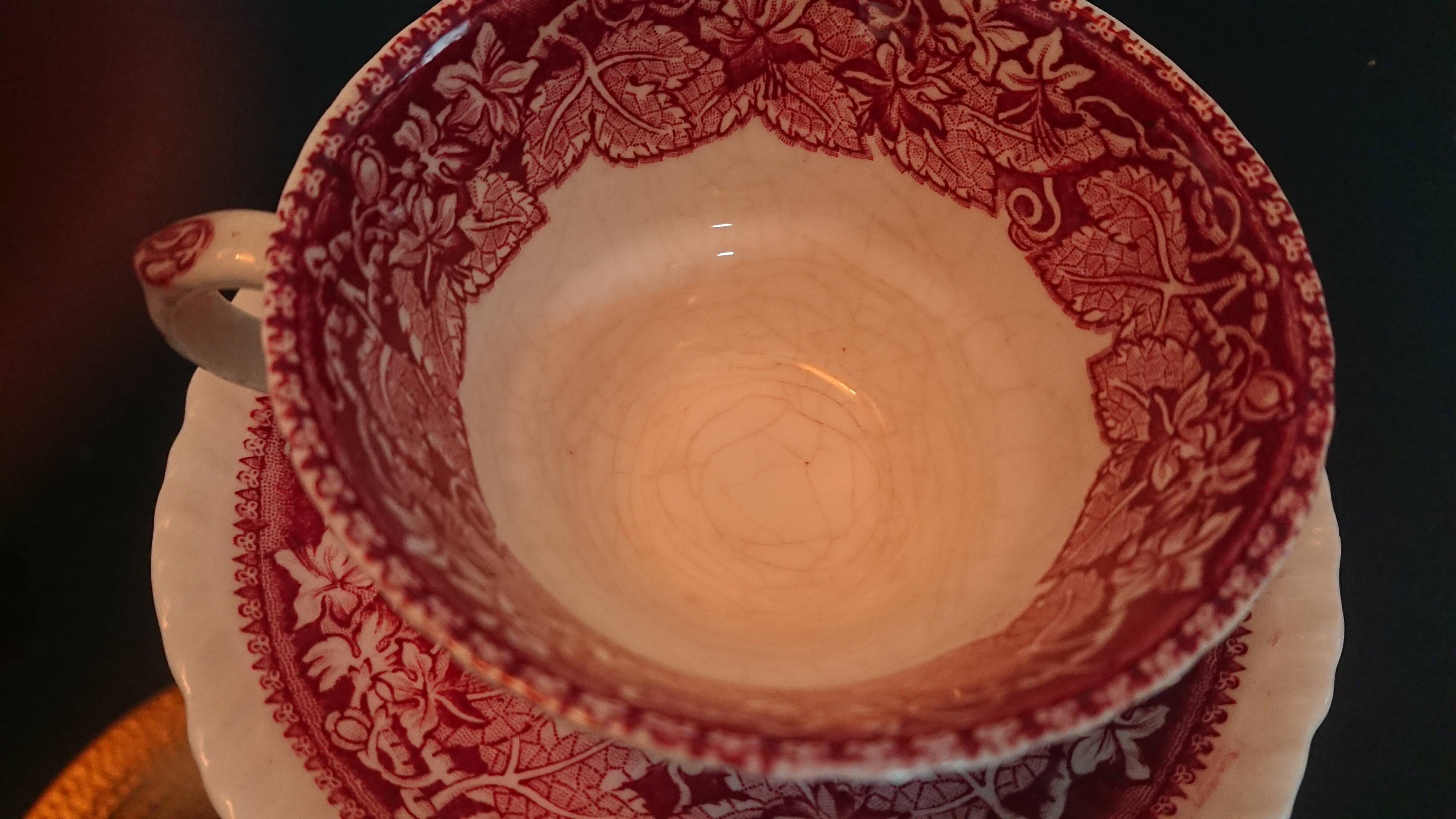 Tea cup and English earthenware saucer