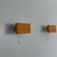 Pair of yellow metal wall lights from the mid-century by N Leuchten, 1960s, Germany.