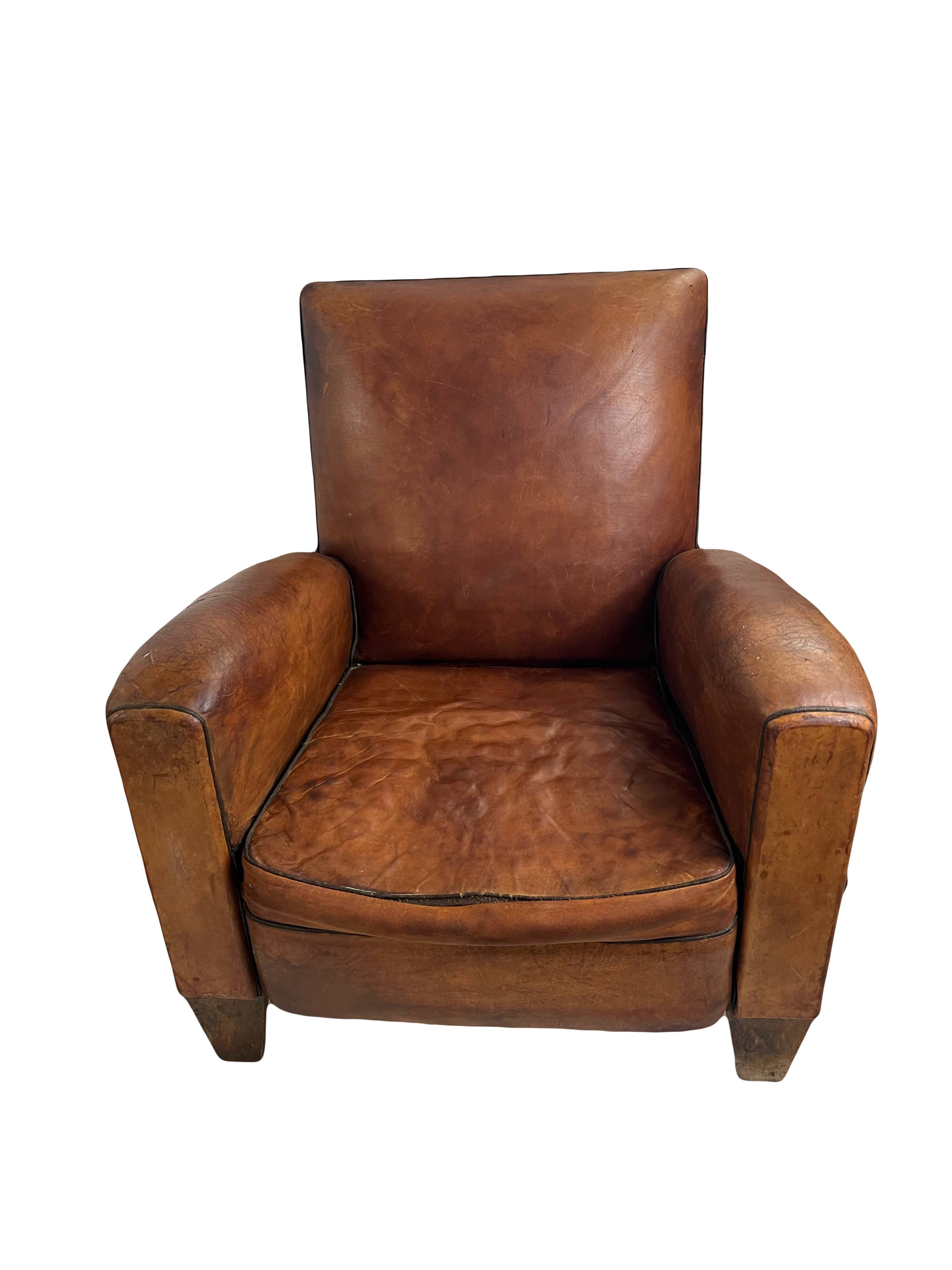 Paire de fauteuils club en cuir patiné – années 1940/50