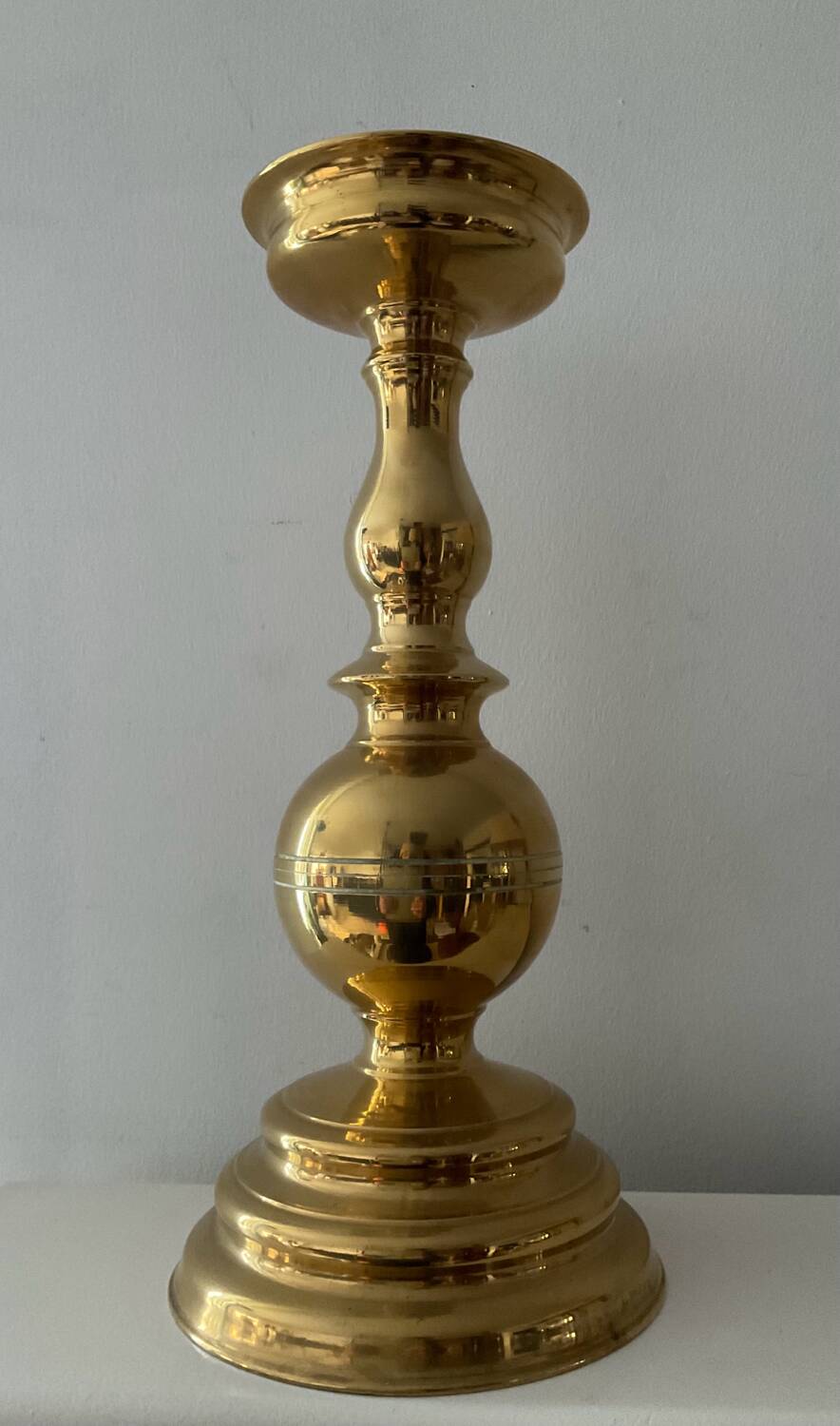 Antique candle holder in solid bronze