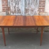 Extendable teak dining table