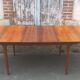 Extendable teak dining table