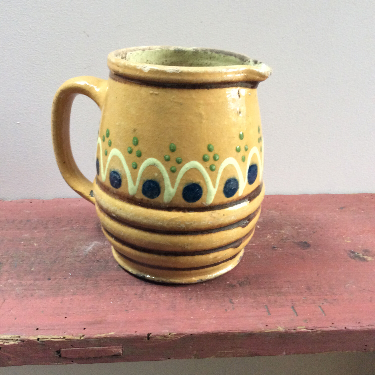 Glazed pottery pitcher