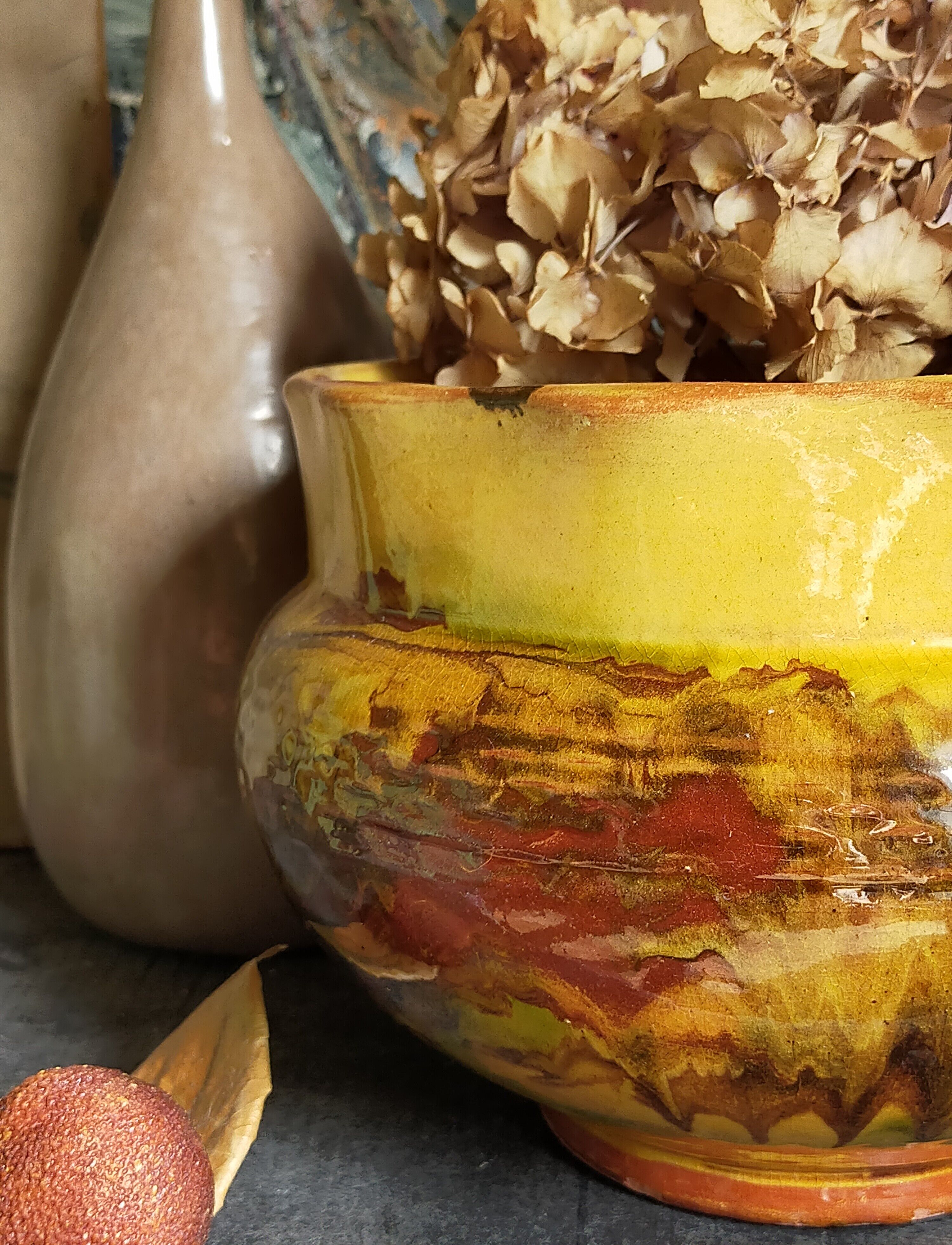 Old provencal pot cover in glazed terracotta