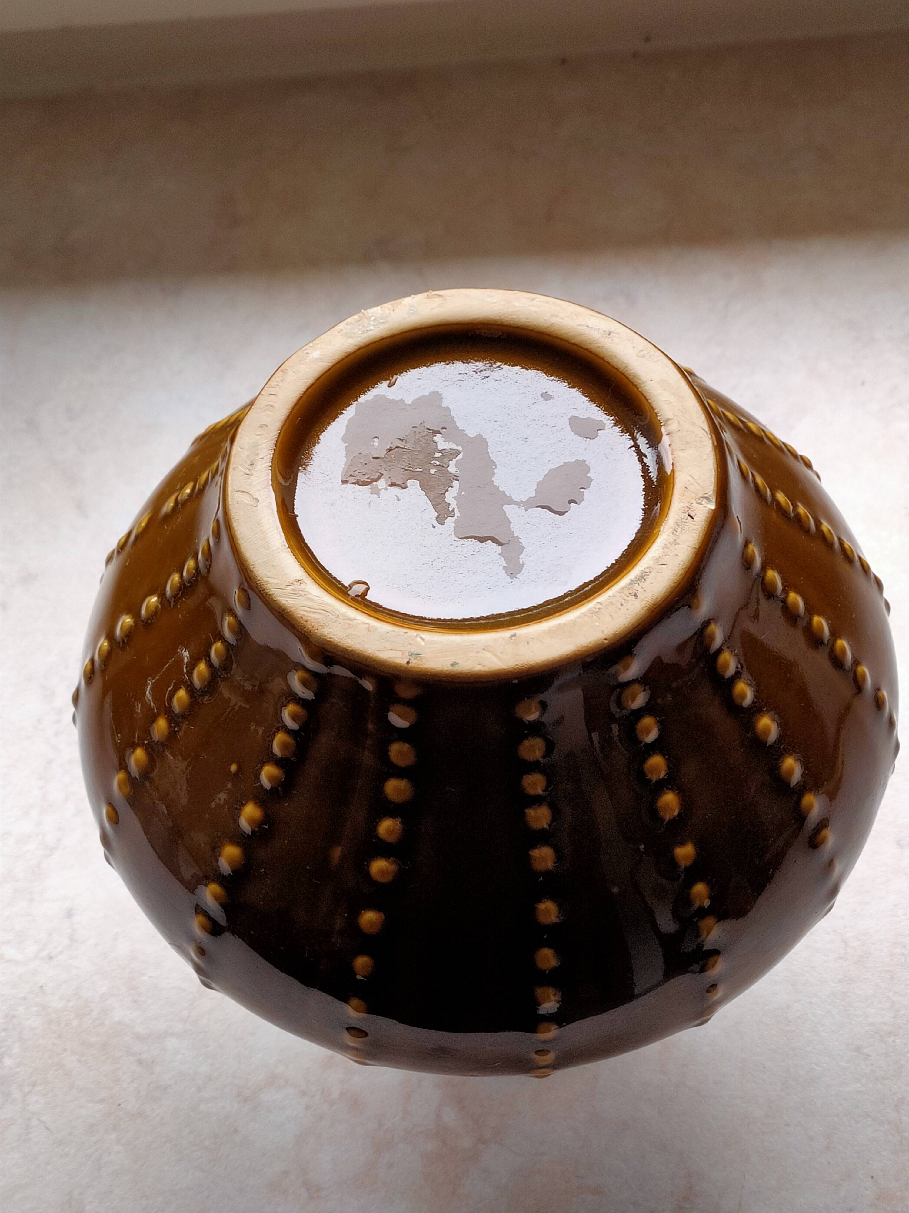 Pear-shaped ceramic vase.