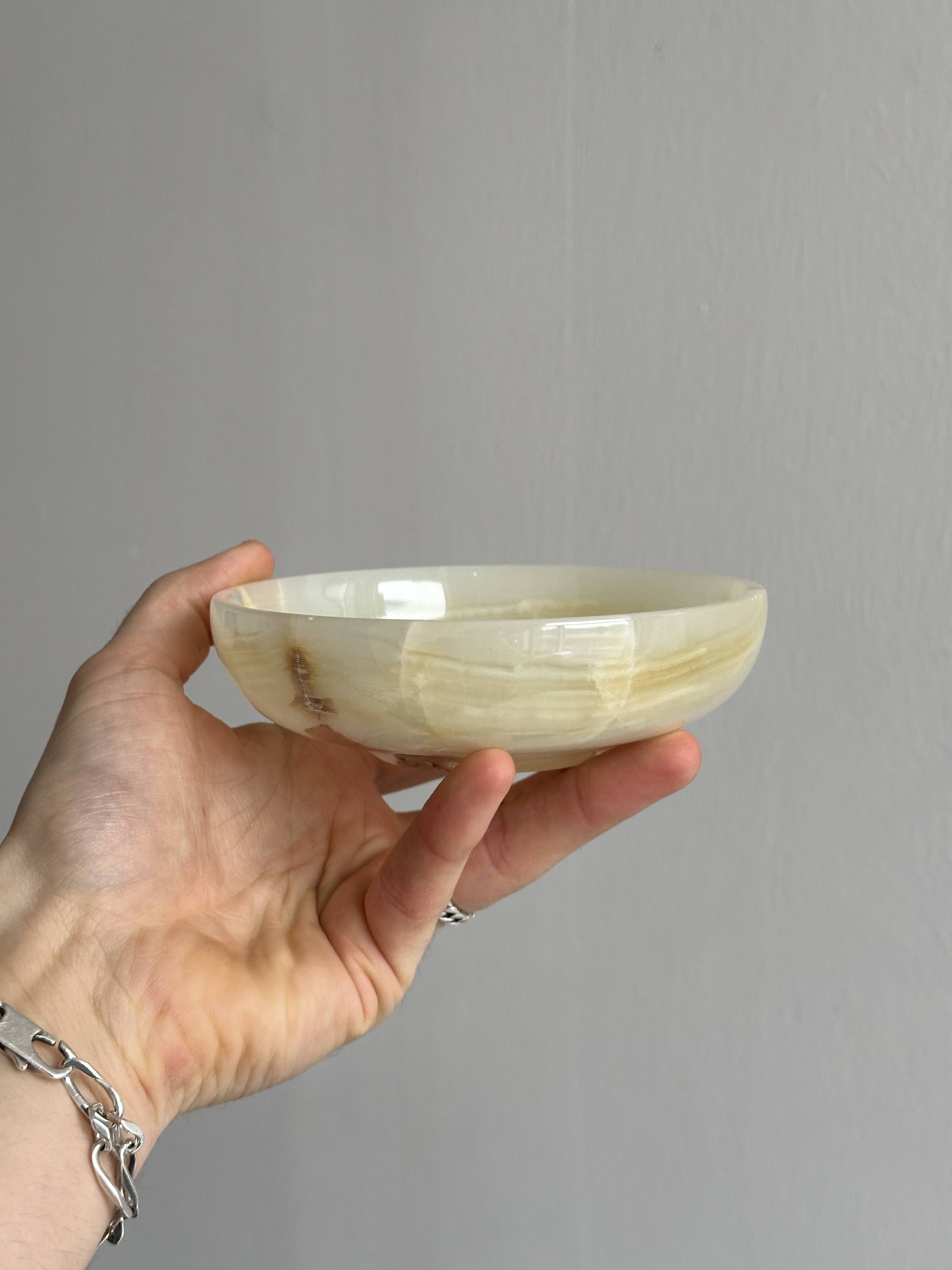 Marbled onyx pocket emptier