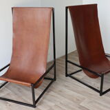 Pair of vintage armchairs in stretched leather and metal structure