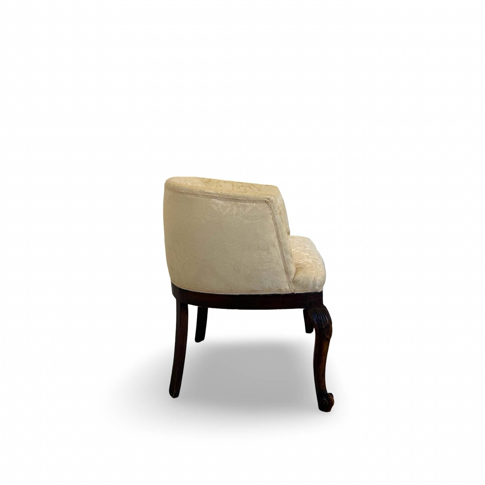 An antique Italian bar chair and a matching tufted vanity stool.