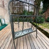 Art Deco magazine rack in wrought iron with bronze patina from around 1930-1940.