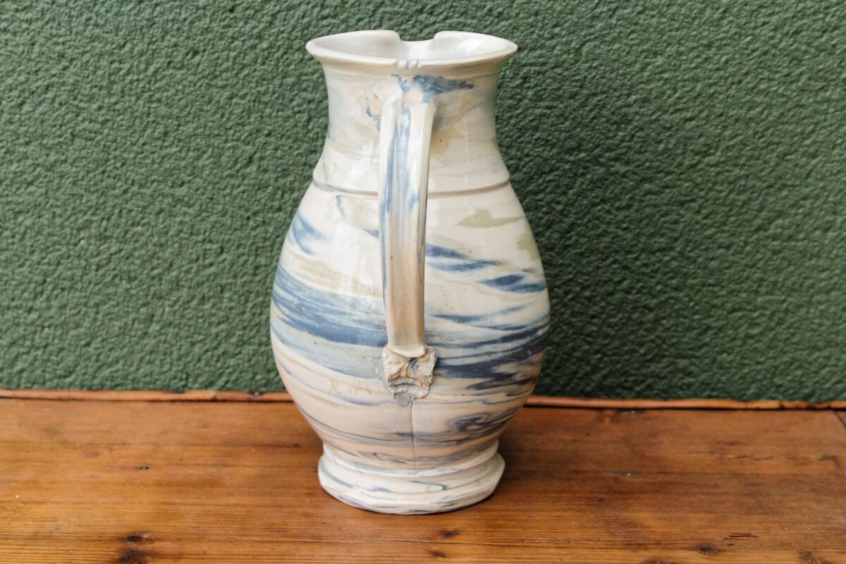 Water jug, signed, blue and white scrolls