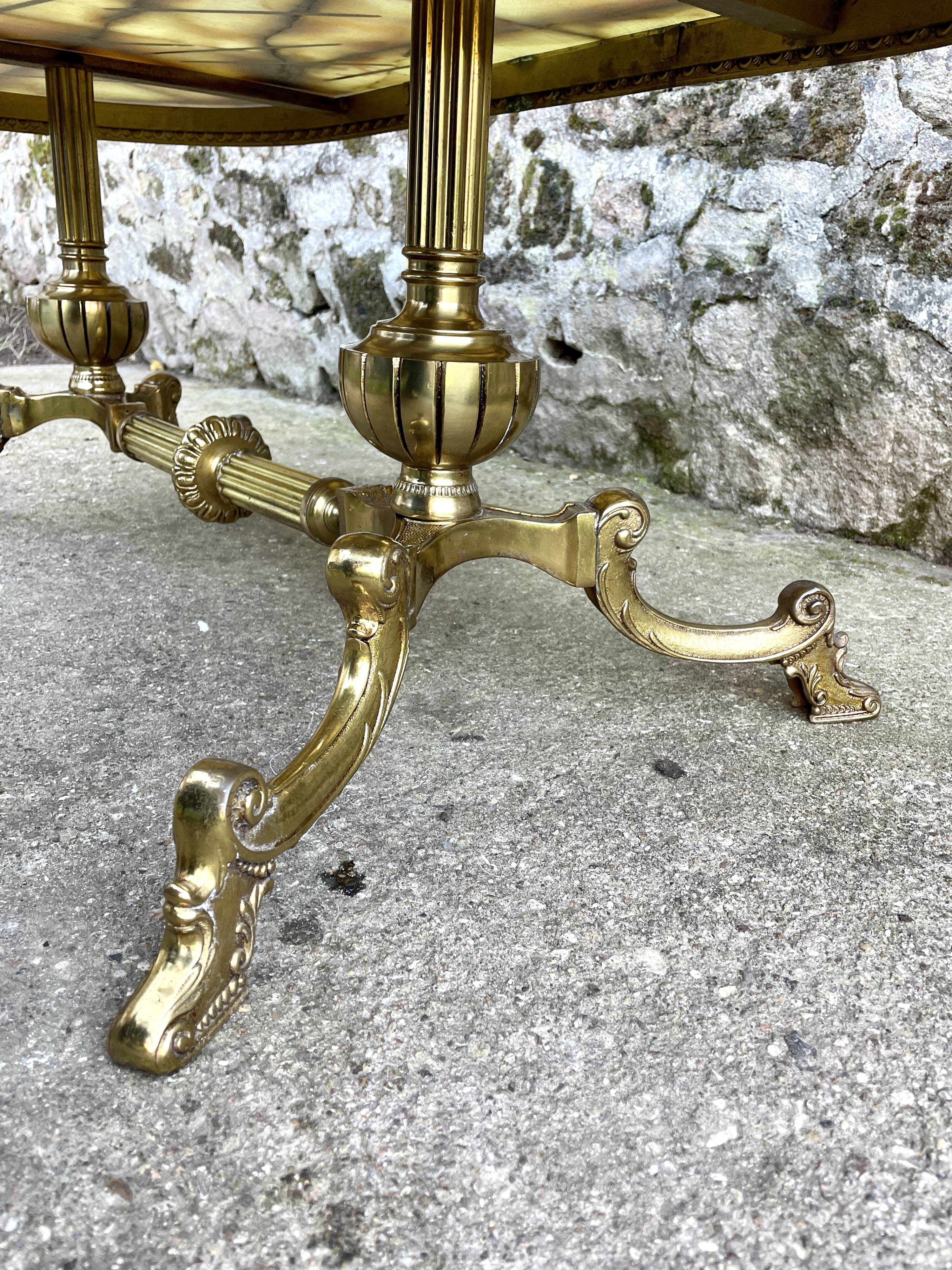 Louis XVI style oval coffee table in onyx and gilt brass
