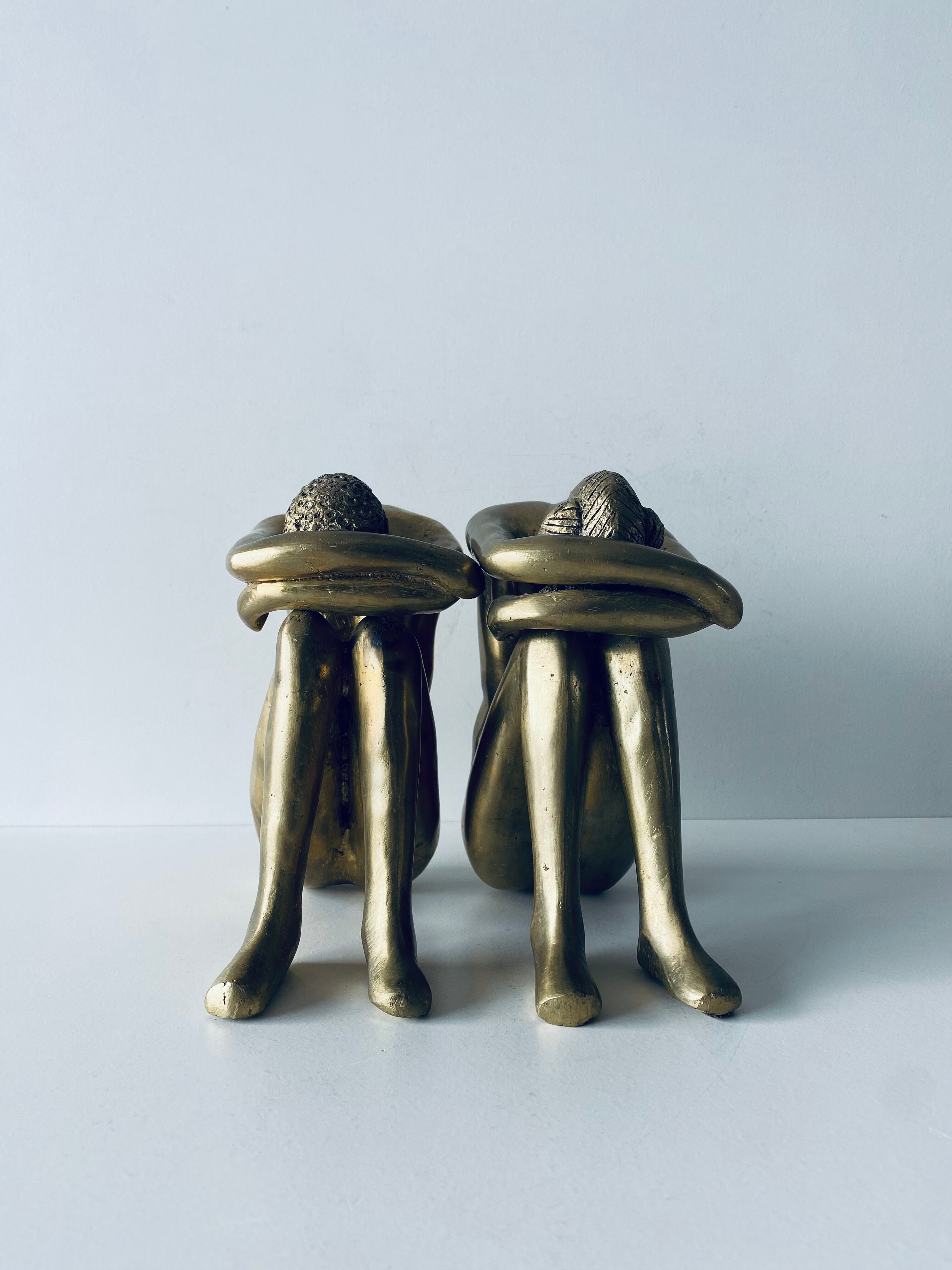 Couple carved in gilded bronze