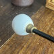 Metal and porcelain hook
