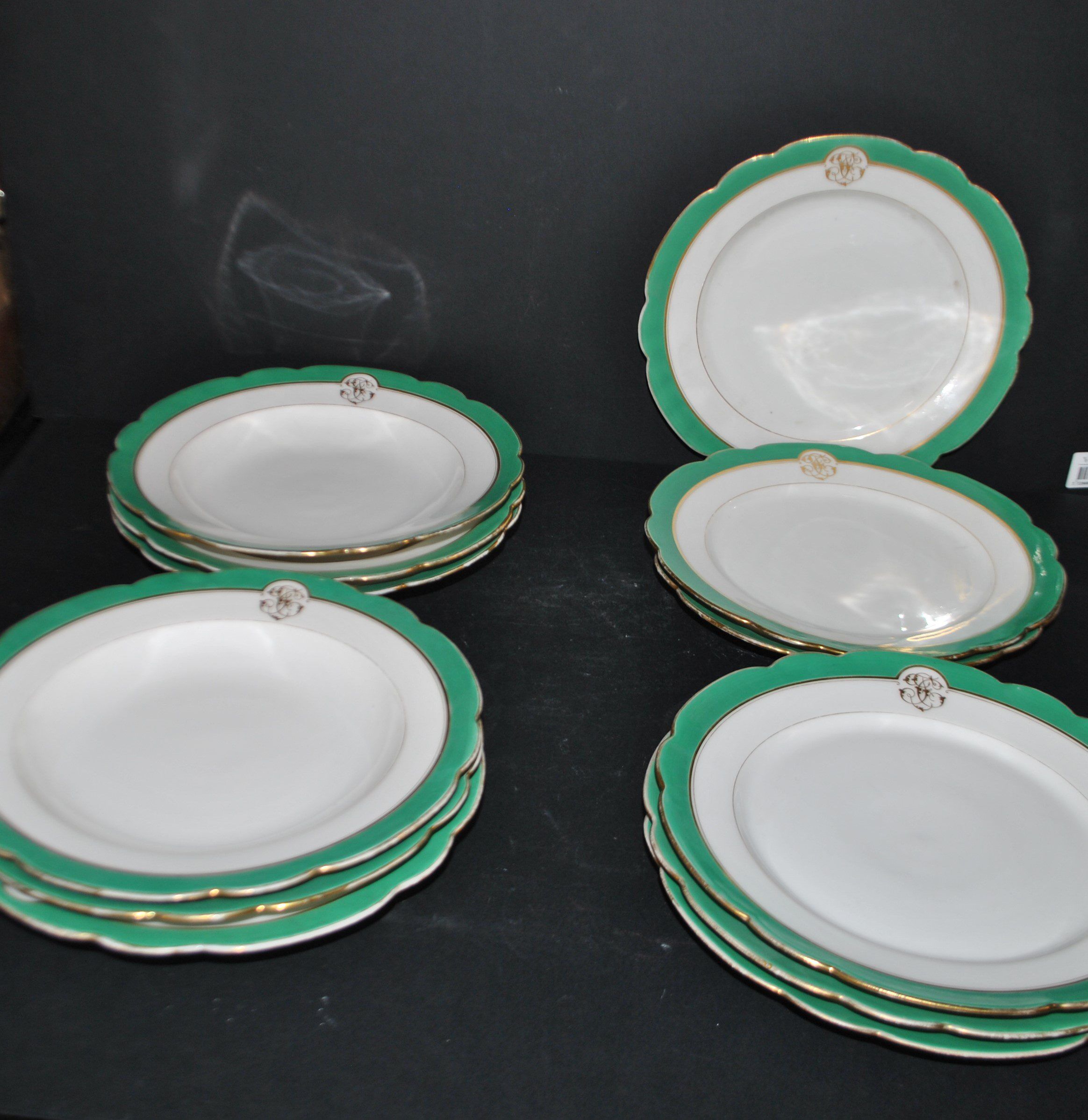 Paris porcelain set of 6 flat plates and 6 deep plates with JC gold monogram.