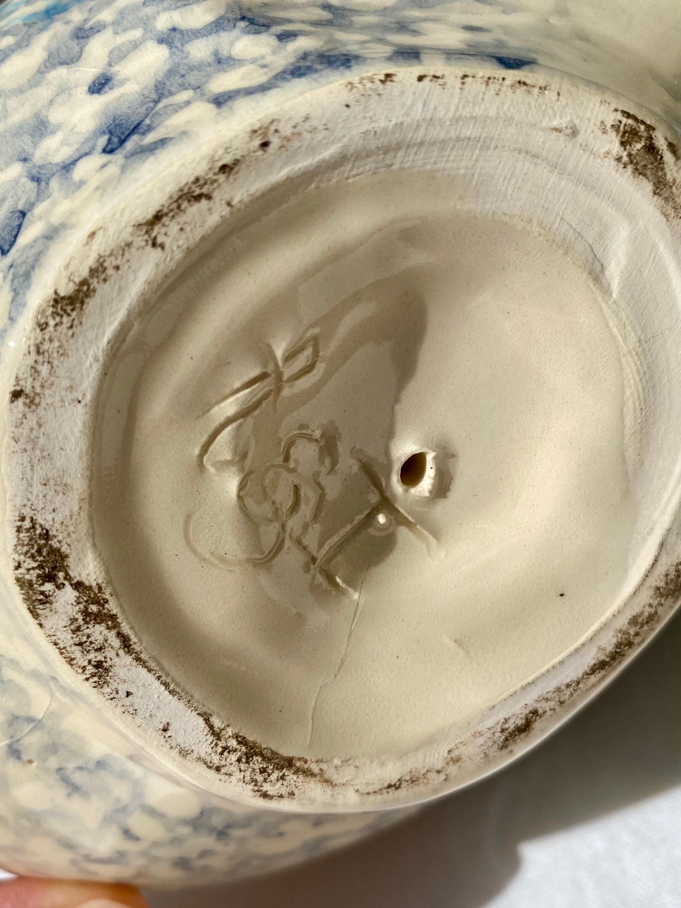 Signed ceramic hen and guinea fowl