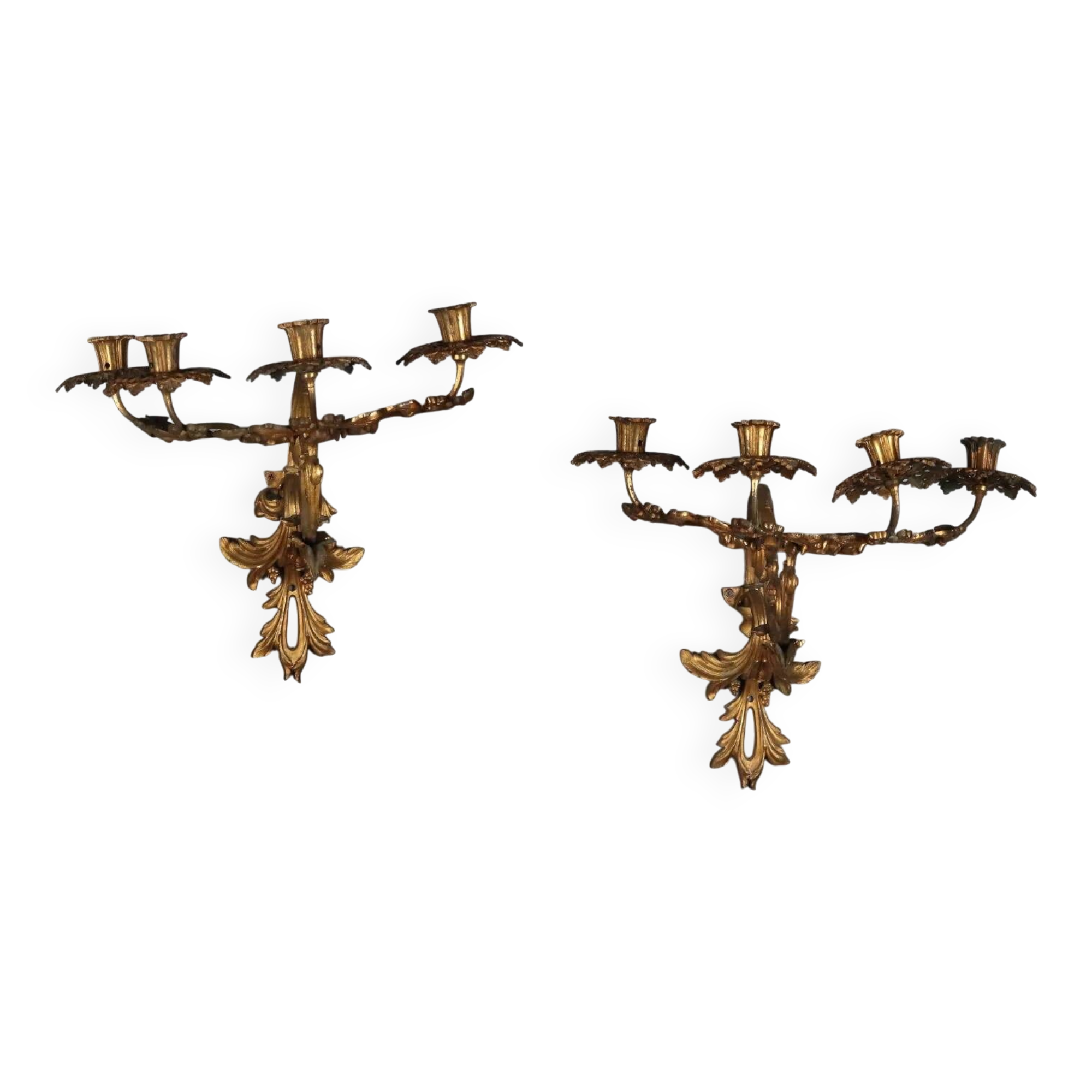 Antique wall sconces in gilded bronze, 20th century, in baroque style.