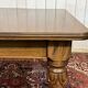 Victorian-style mahogany English table with 3 extensions.