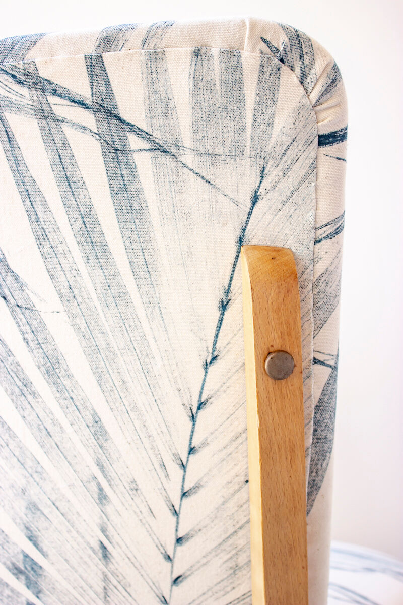 Pair of vintage chairs reupholstered with palm pattern fabric