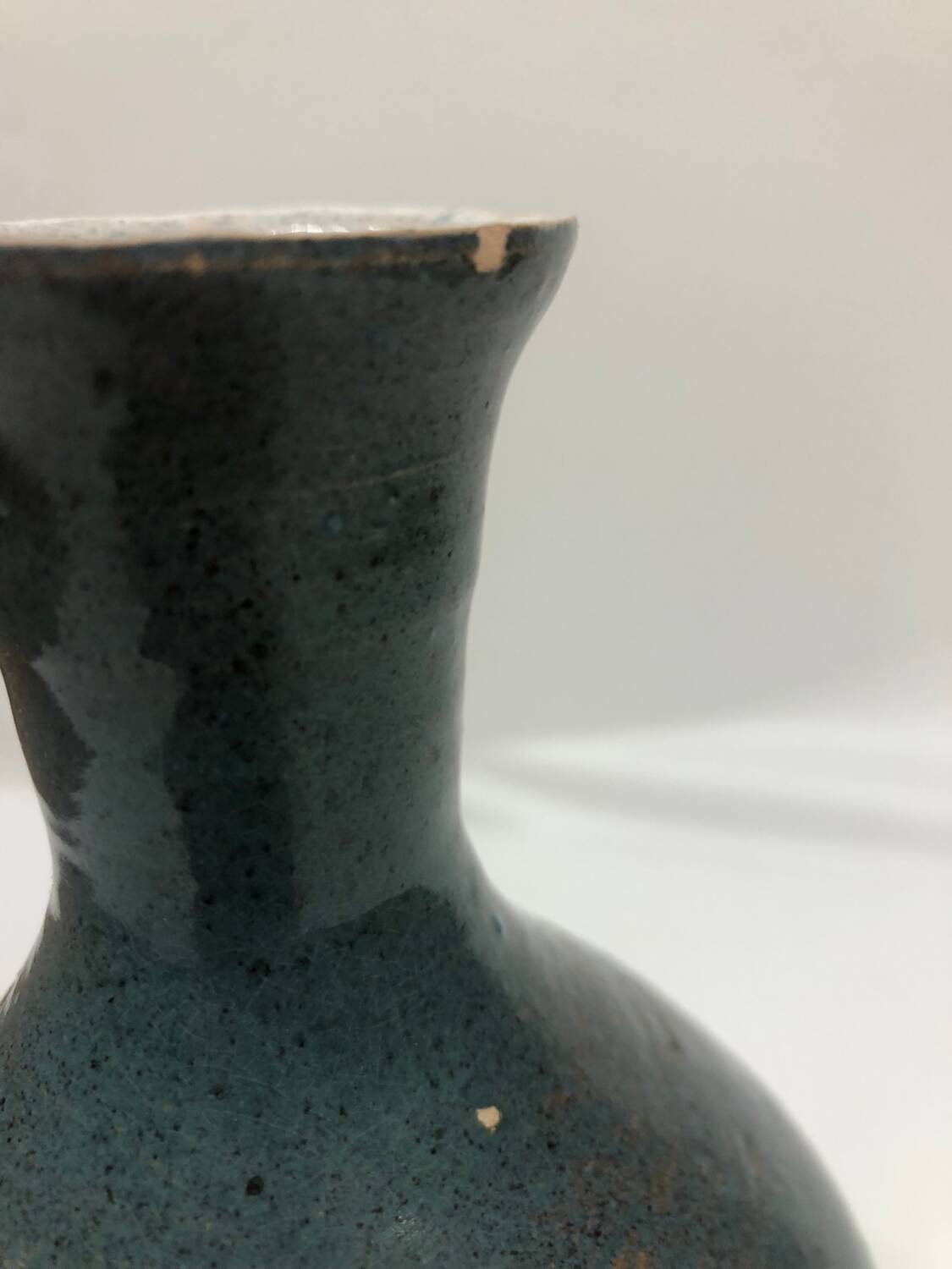 Light blue speckled ceramic vase