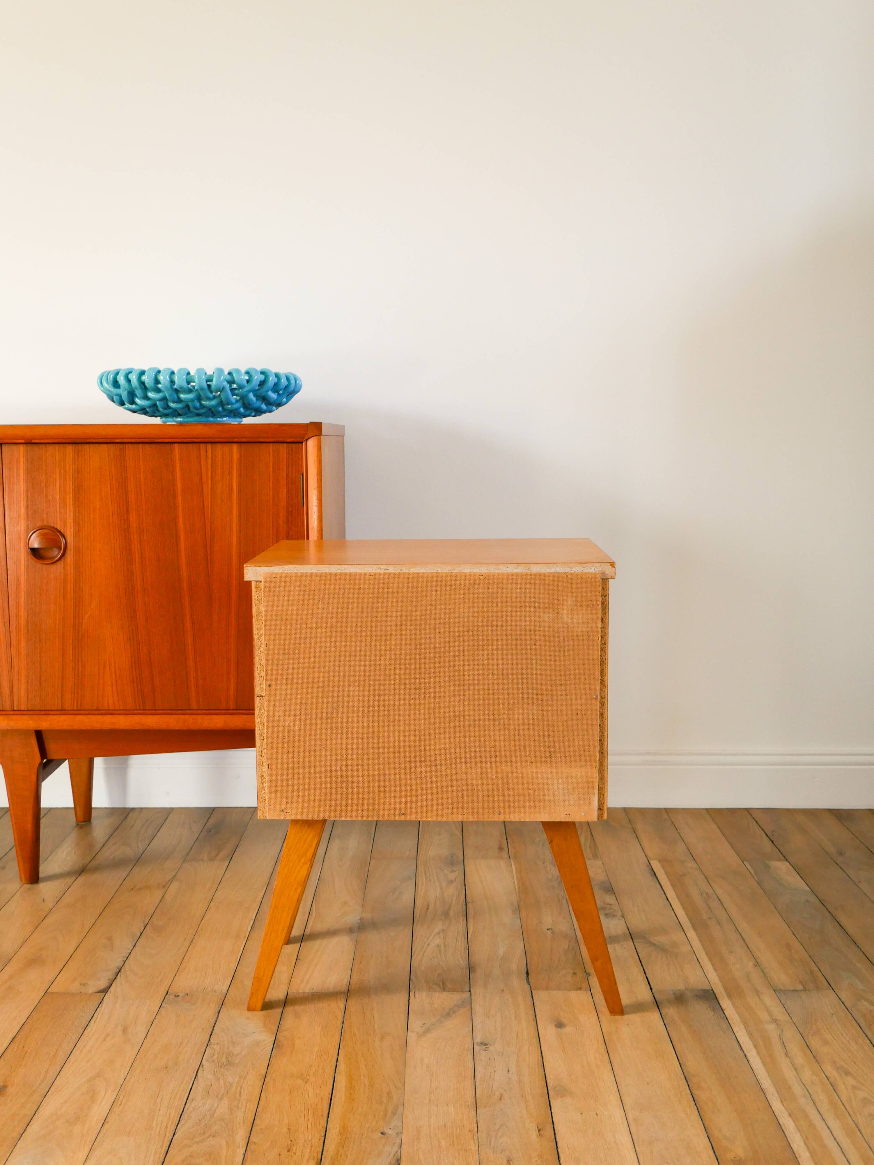 Scandinavian bedside table in teak veneer, with tapered legs and a drawer, 1960.