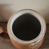 Terracotta pot with rounded handle